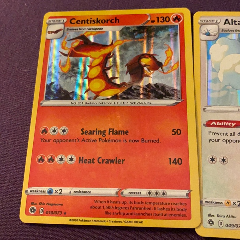 Three Pokémon Cards